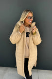 Showstopper Long Puffer Jacket